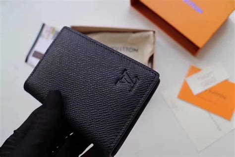 louis vuitton airtag wallet.